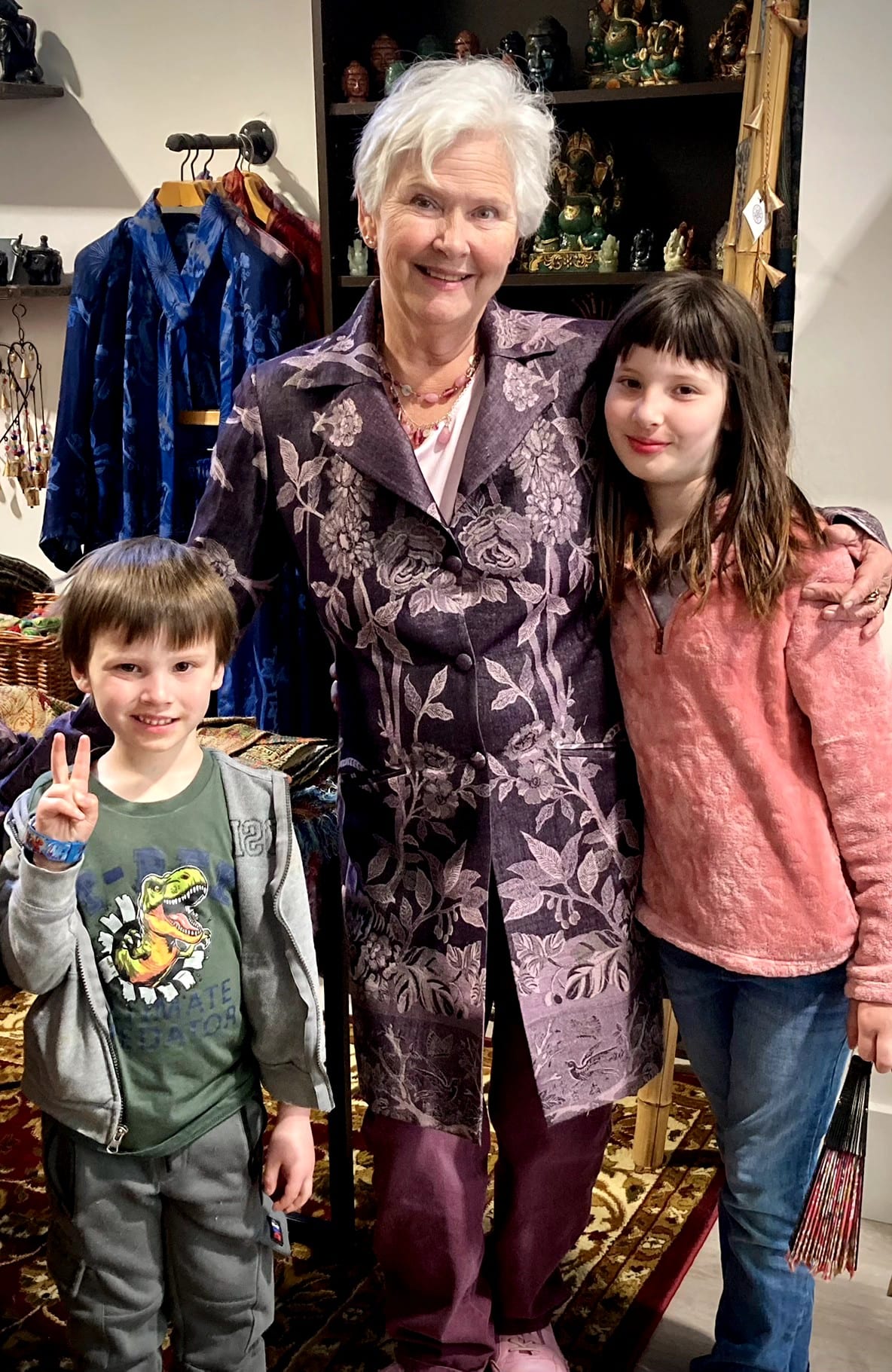 Grandmother with her grandchildren visiting Taj Mahal Emporium